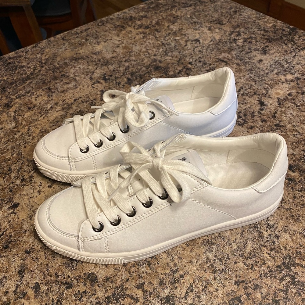 COACH sneakers. White in color